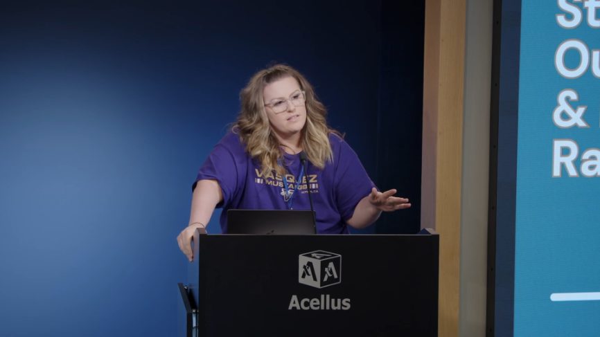 A district leader presenting from the Acellus lectern